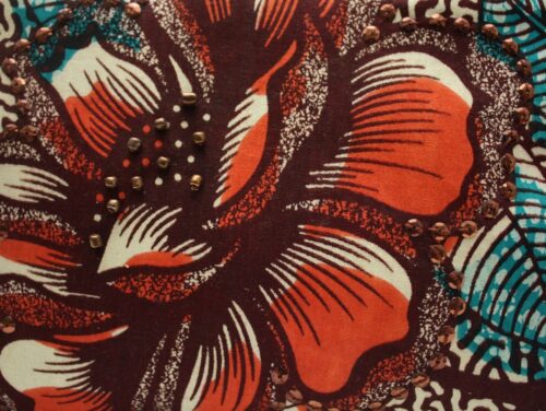 Burnt Orange Ankara print clutch- flower detail